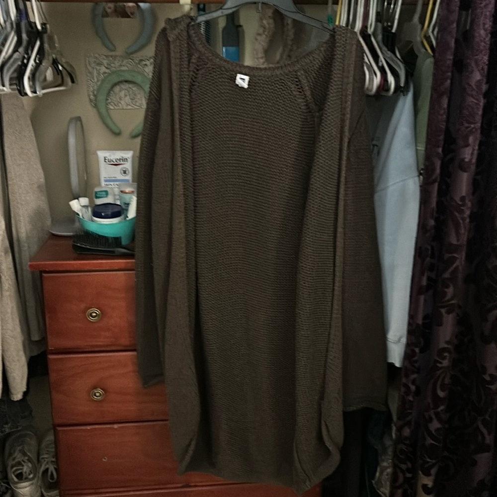 Brown cardigan.